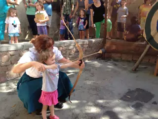 Ciana Shooting an Arrow