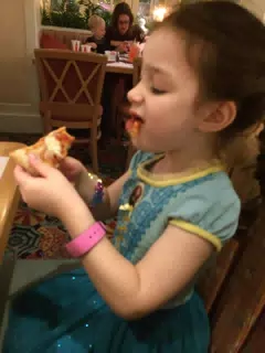 Liesl with Pizza in Disney World