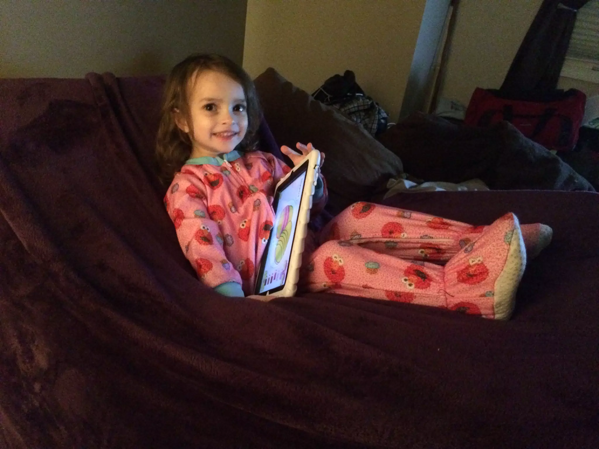 Luciana with iPad