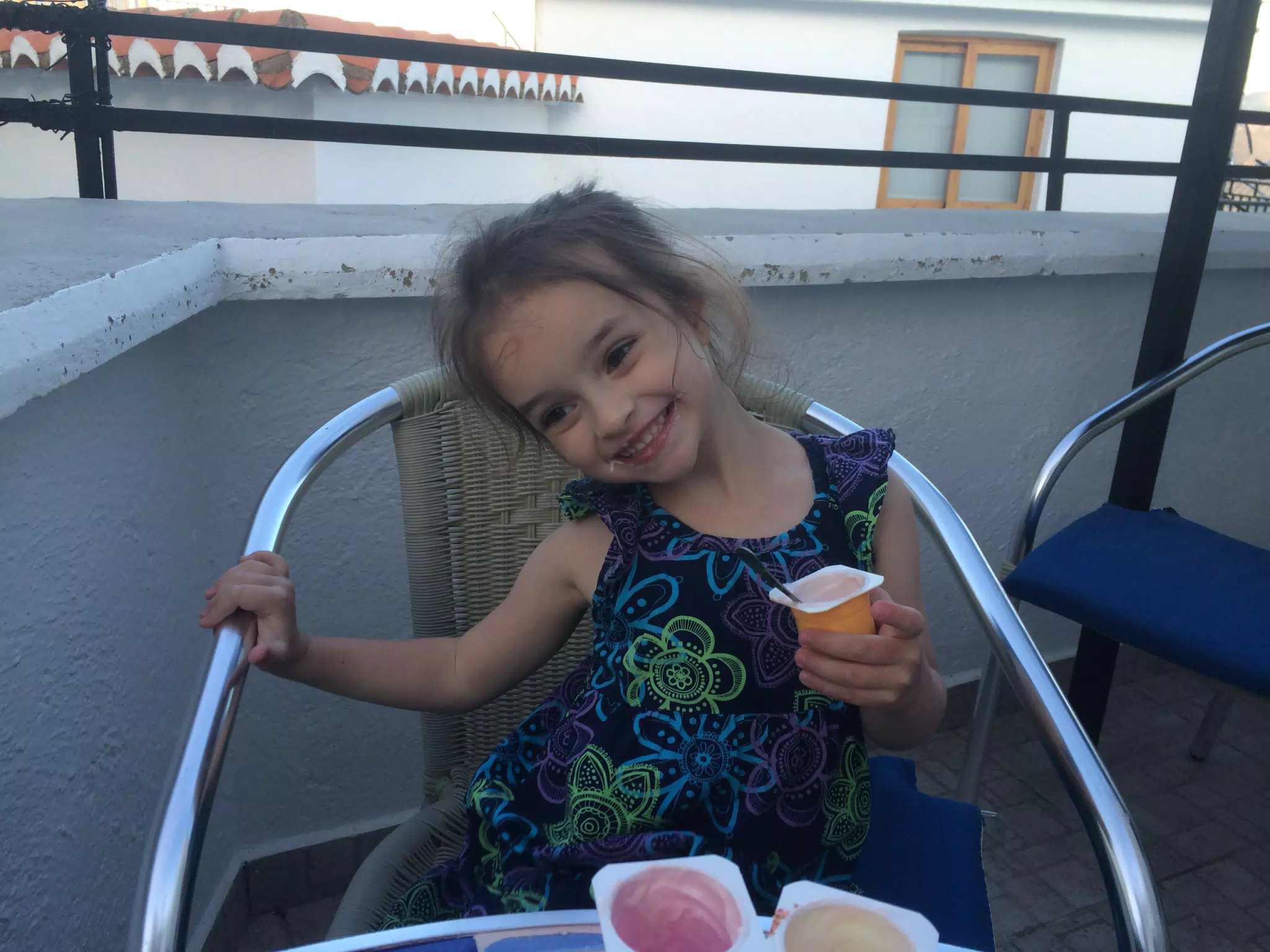 Luciana Having Yoghurt on the Terraza