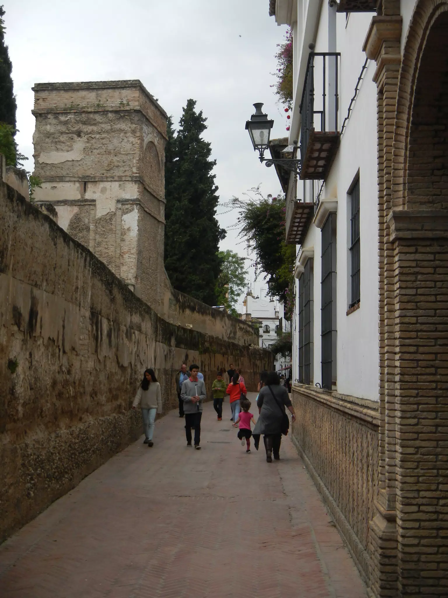 The Family Walking the Sevilla City Wall