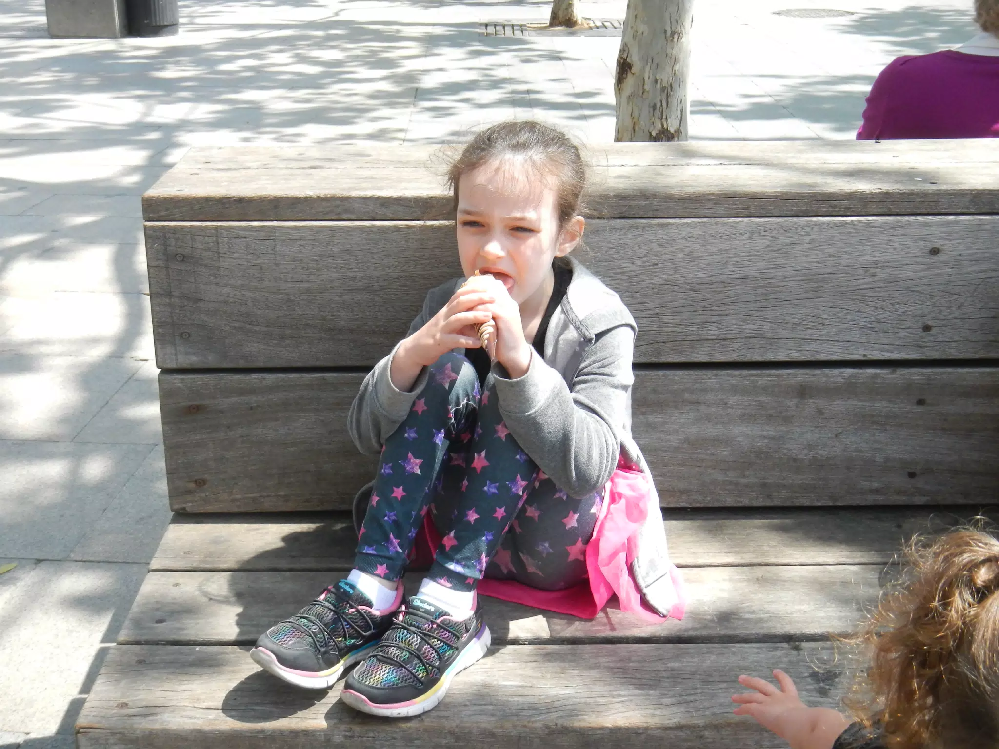 Liesl Eating Ice Cream on Bench