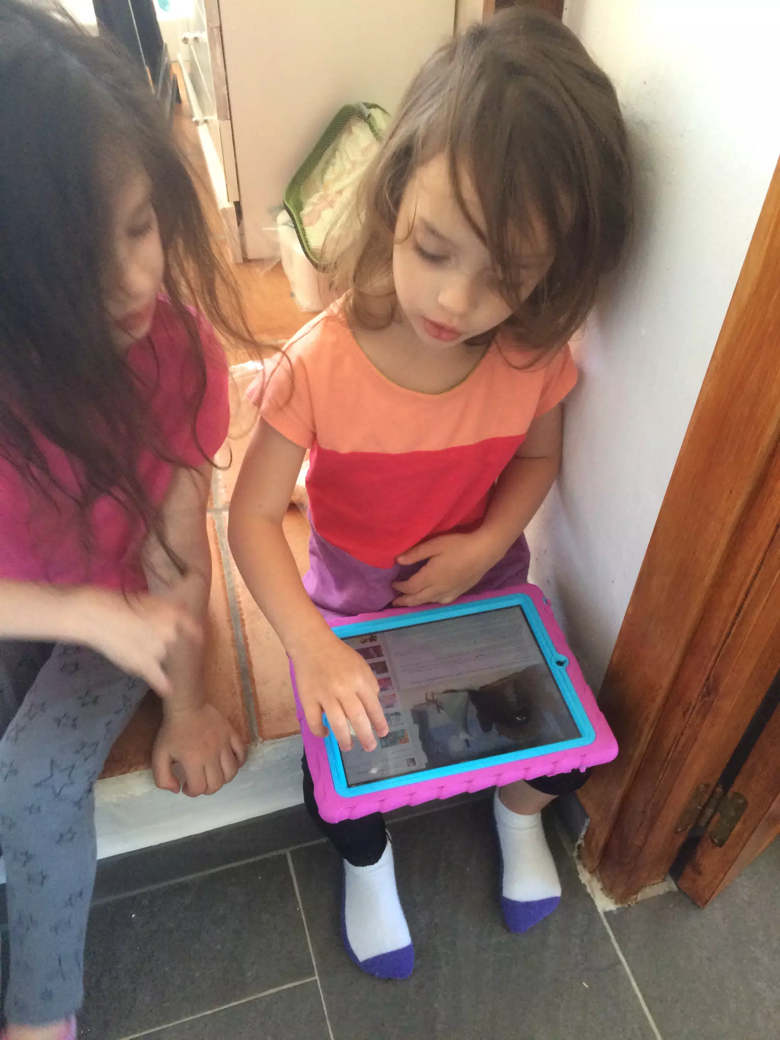 Sister with an iPad