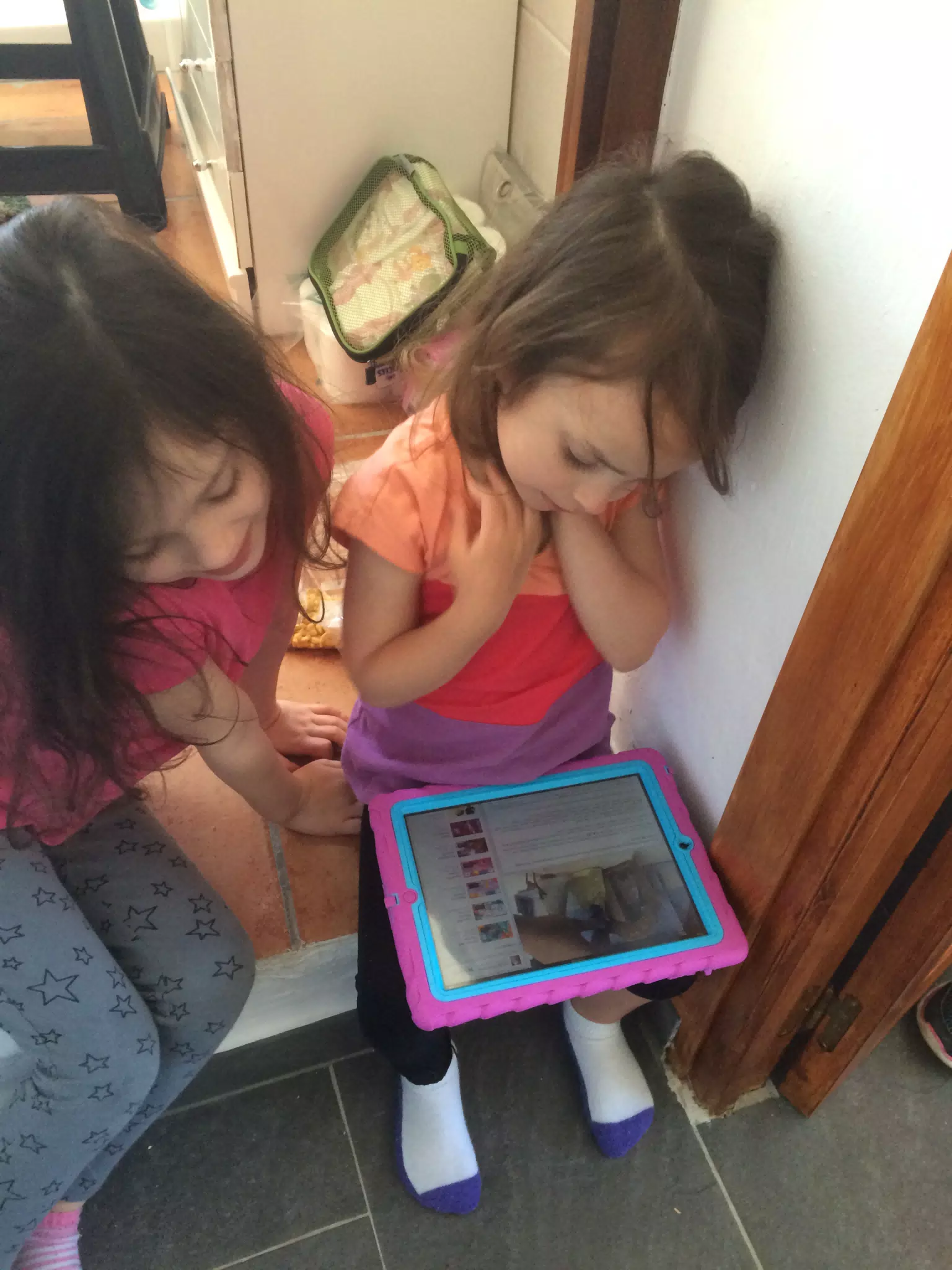 Sister with an iPad