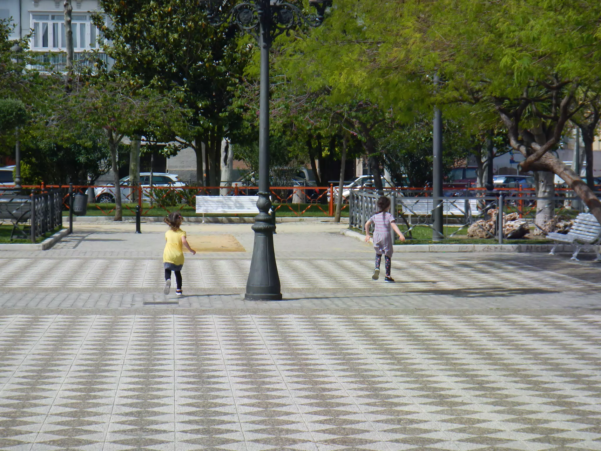 The Girls Running in the Plaza de Espańa in Cádiz