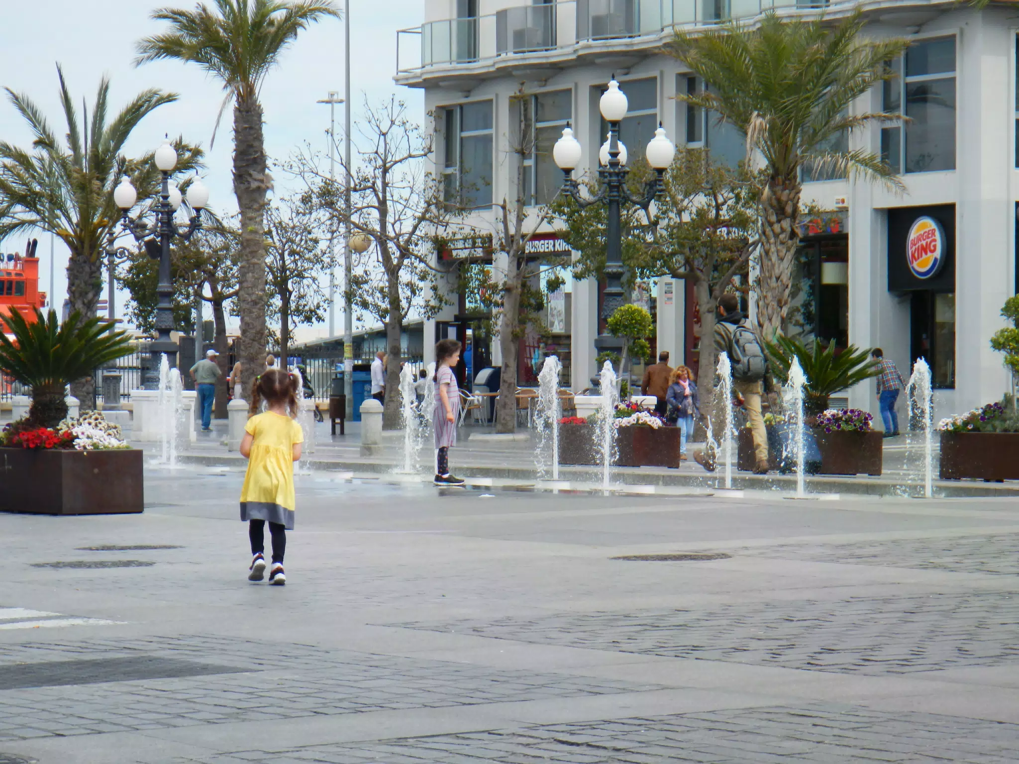 The Girls Checking out the Fountain