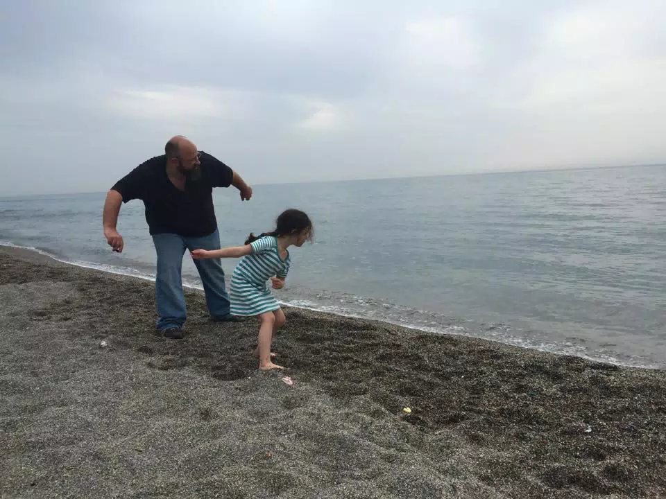Teaching Liesl to Skip Rocks on the Mediterranean.