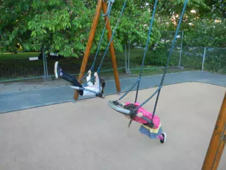 The Girls on the Swings in Oslo, Norway