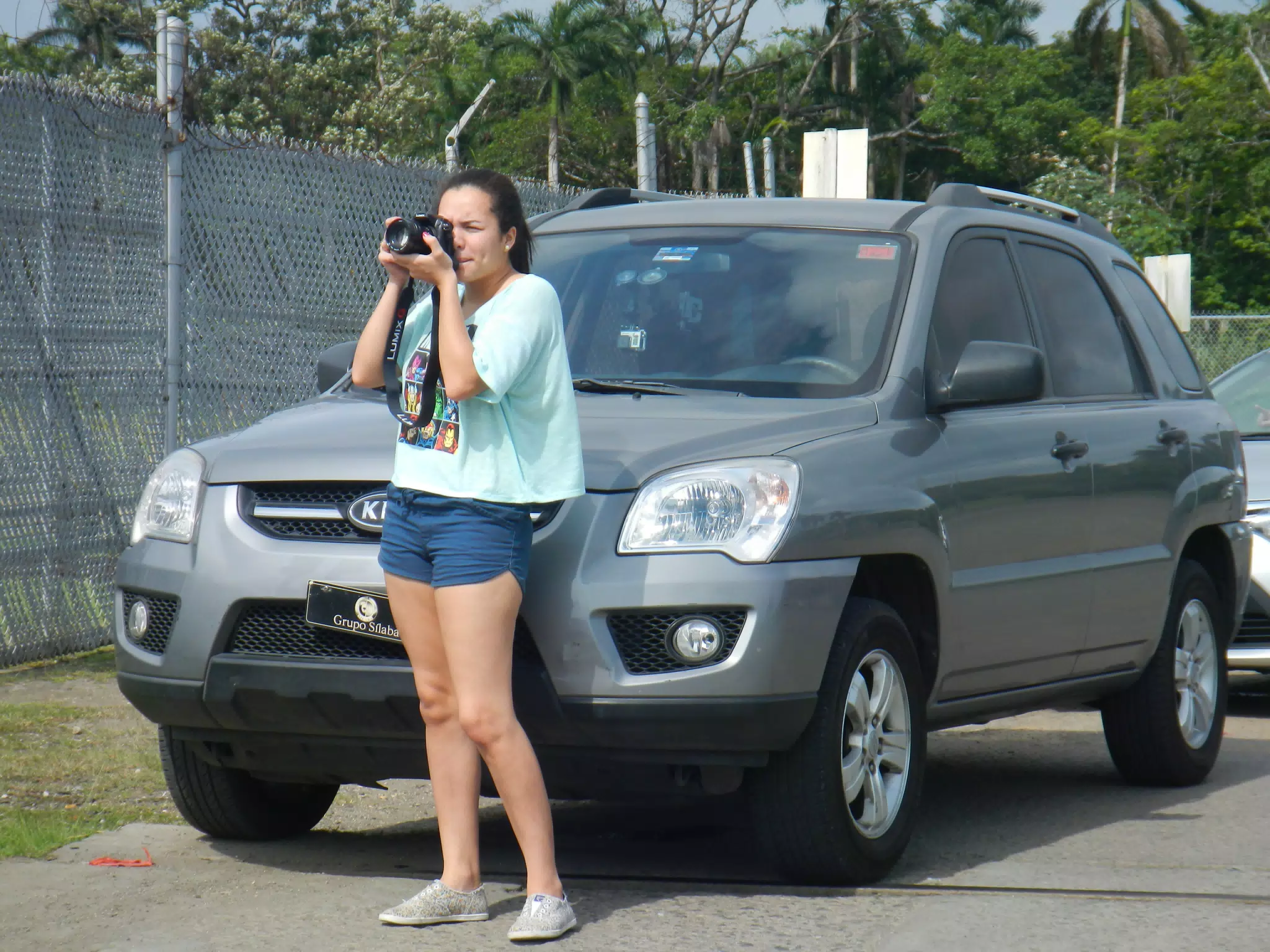 Maggie with Lumix Taking Picture in Panama