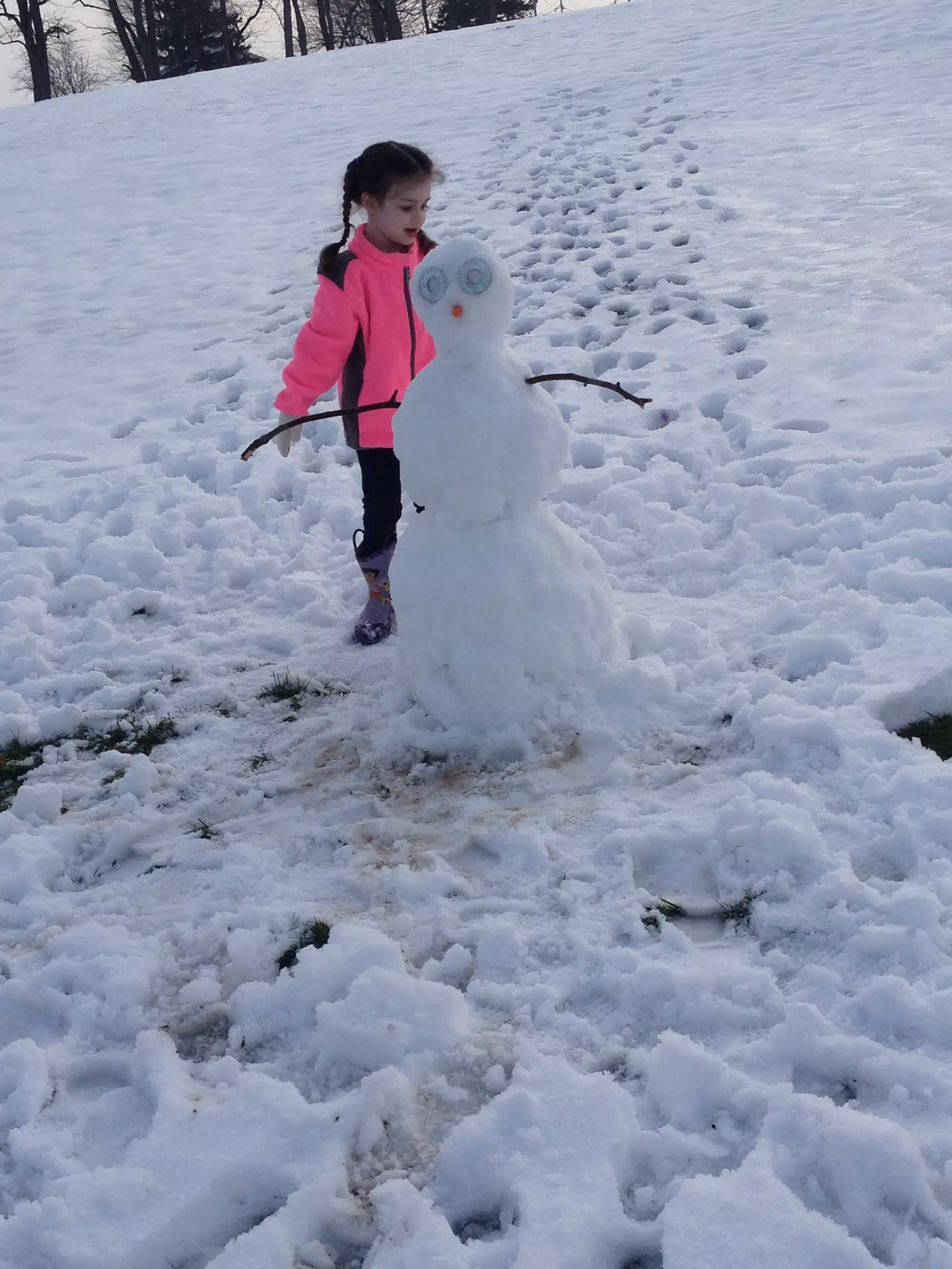 Liesl Making a Snowman 2013 on the Farm