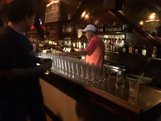 Preparing the Flaming Doctor Peppers at Touchés