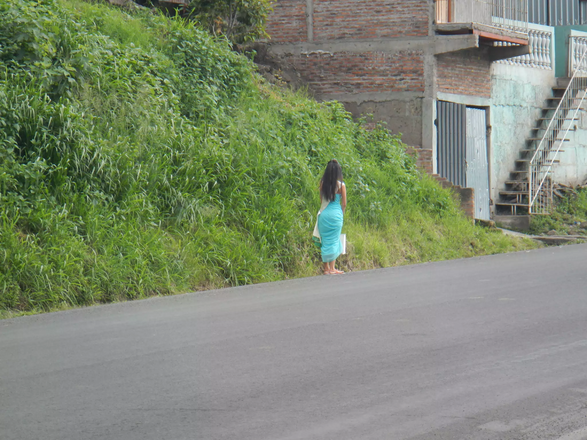 Overdressed Girl First Thing in the Morning in Matagalpa