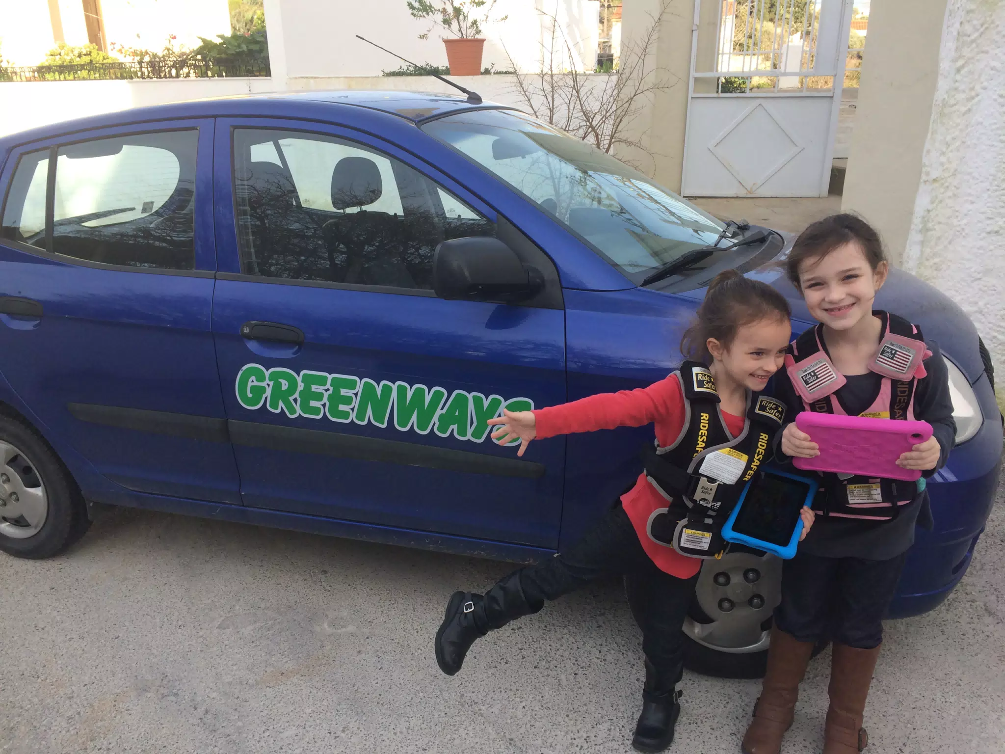 Luciana and Liesl Ready for First Car Ride on Crete