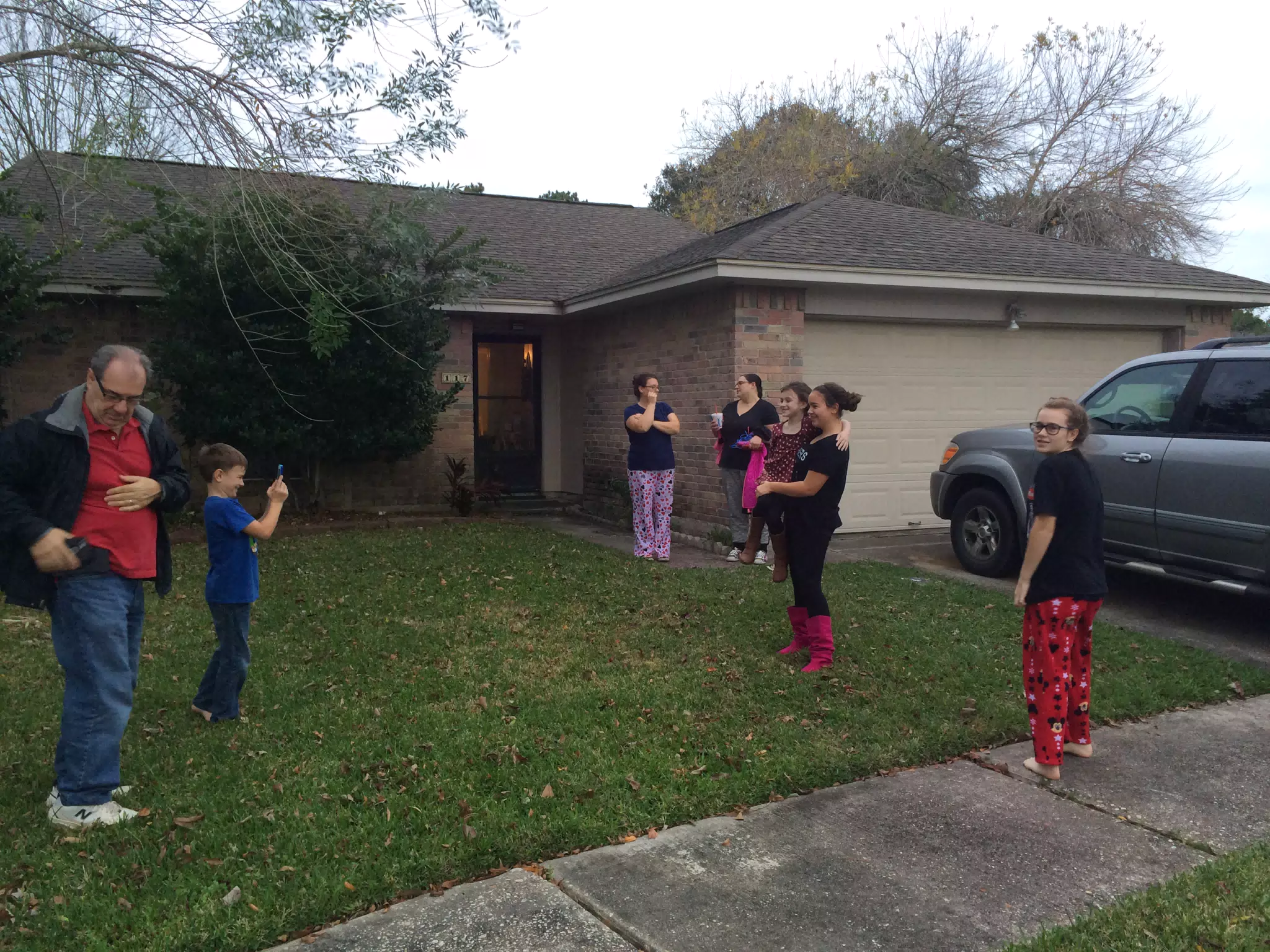 Family Outside As We Load the Car to Leave