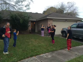 Family Outside As We Load the Car to Leave