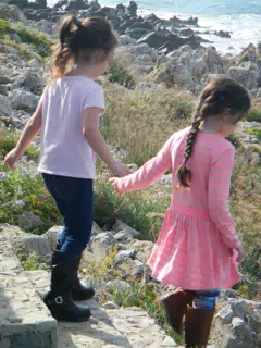 Luciana and Liesl Walking Down to the Beach on Crete