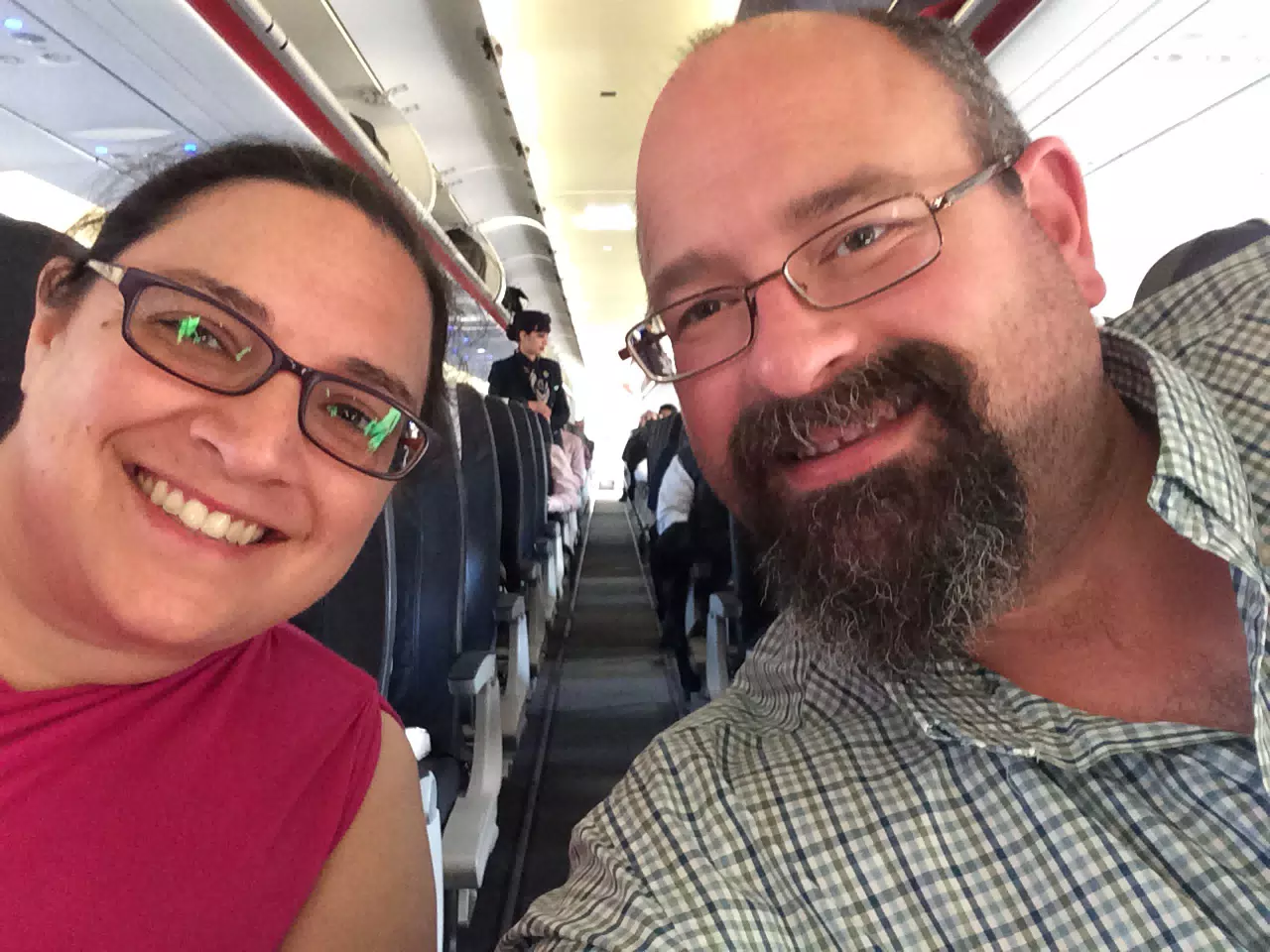 Dominica and Scott Boarding the Plane for Romania