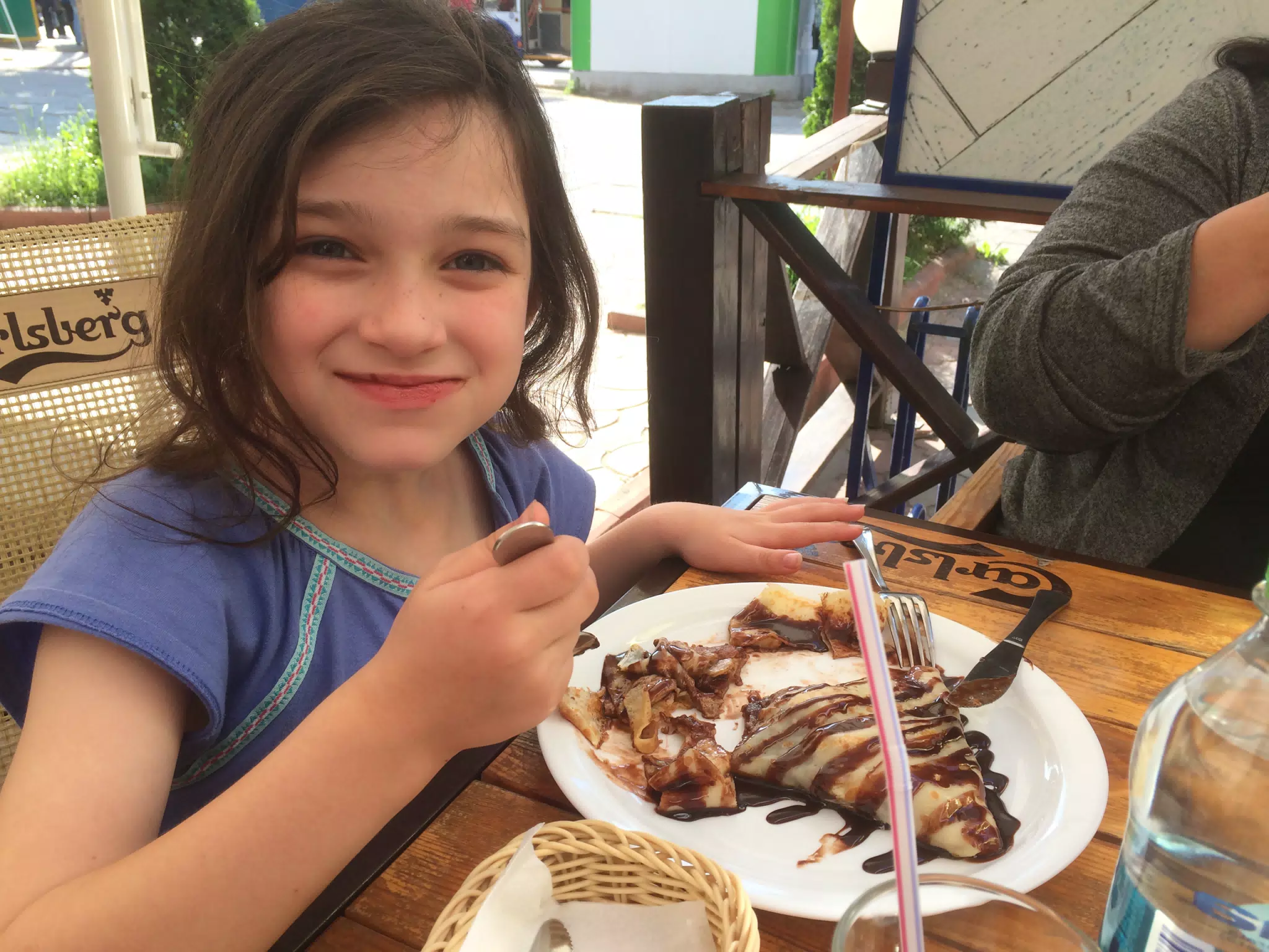 Liesl Eating Crepes in Moldova