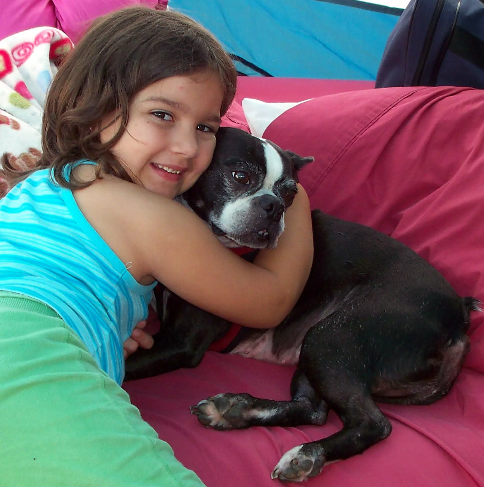 Emily Giving Oreo a Hug in the Tent
