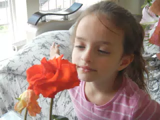 Luciana with Red Flower