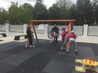Family on a Playground in Northern Romania