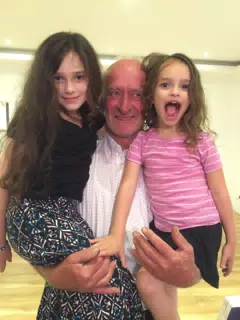 Liesl and Luciana with Their Adopted Grandfather in Romania