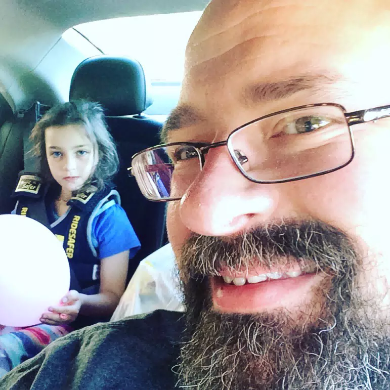 Liesl Riding in Car with Dad