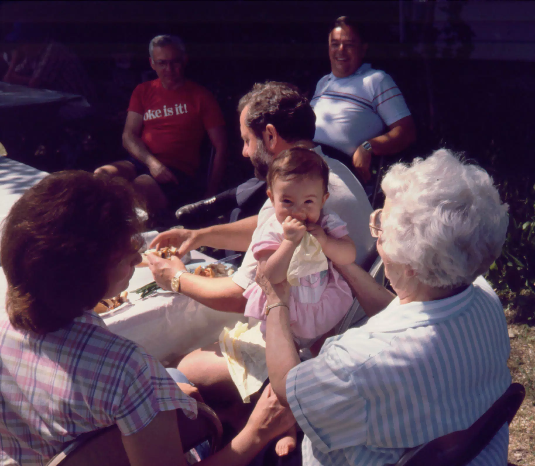 Grandma holding Sara