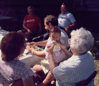 Grandma holding Sara