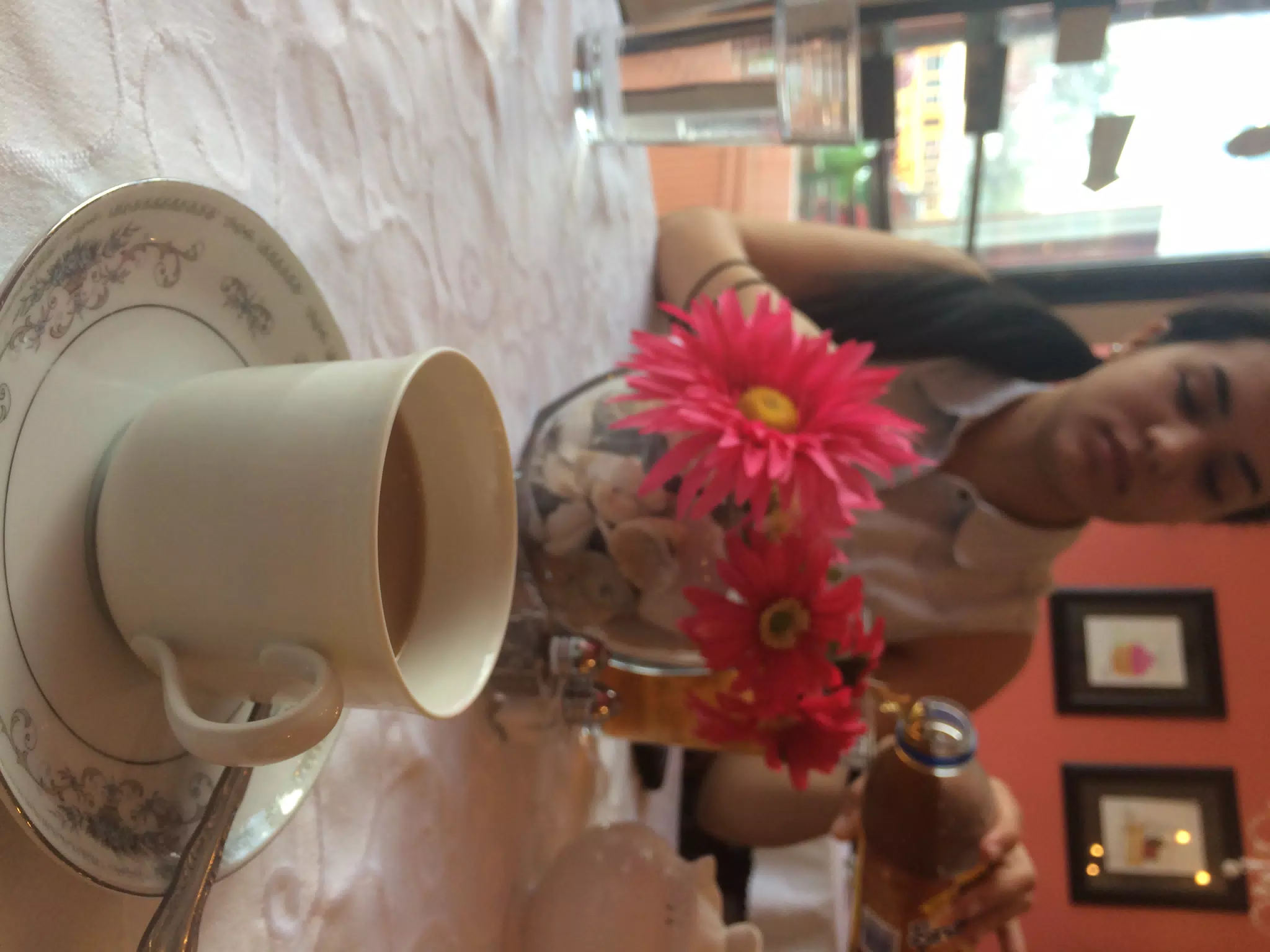 Maggie with Coffee at the Euro Cafe