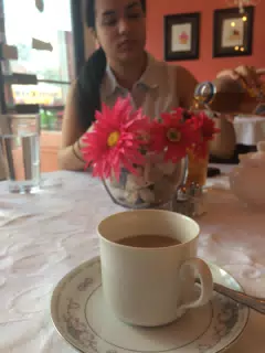 Maggie with Coffee at the Euro Cafe