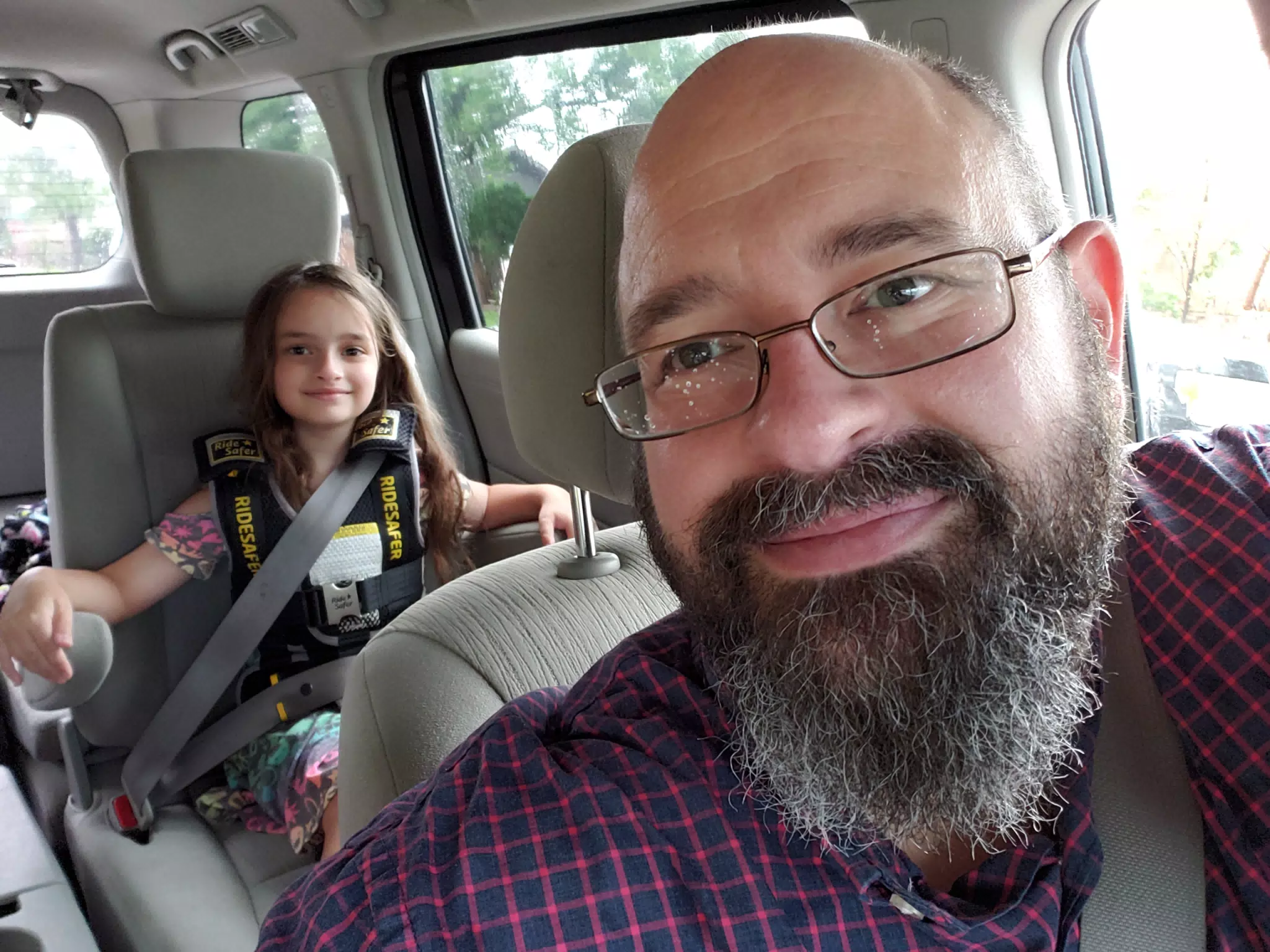 Luciana Taking a Ride with Dad