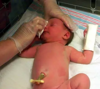 Liesl Starting Her First Bath with Nurse Lisa