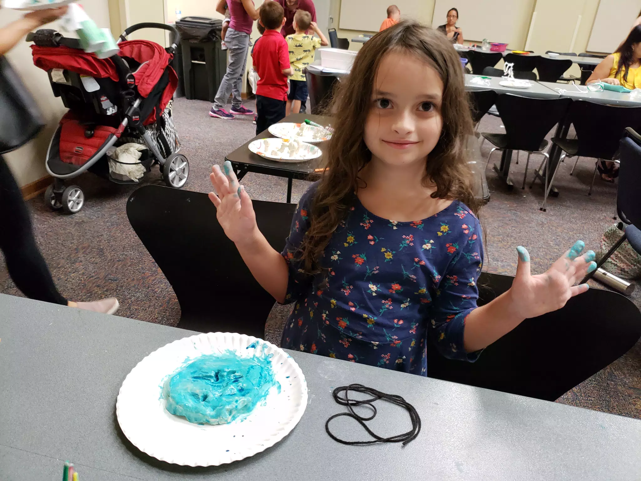 Luciana at the Farmer's Branch Dinosaur Library Event