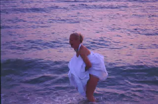 Michelle in Gulf of Mexico in Wedding Dress