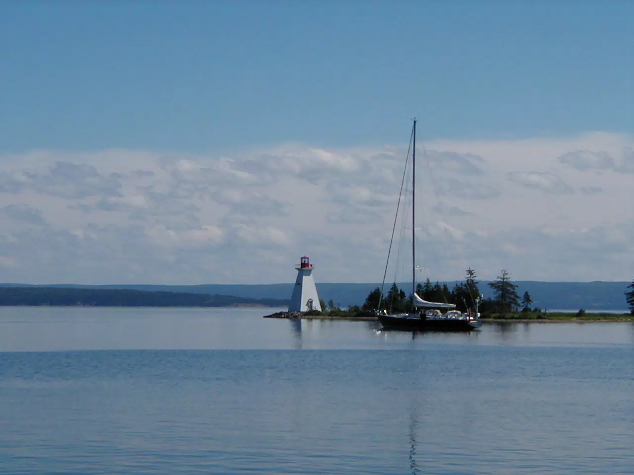 Sailboat and Lighthouse on Bras D'Or Lake, NS