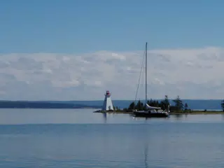 Sailboat and Lighthouse on Bras D'Or Lake, NS