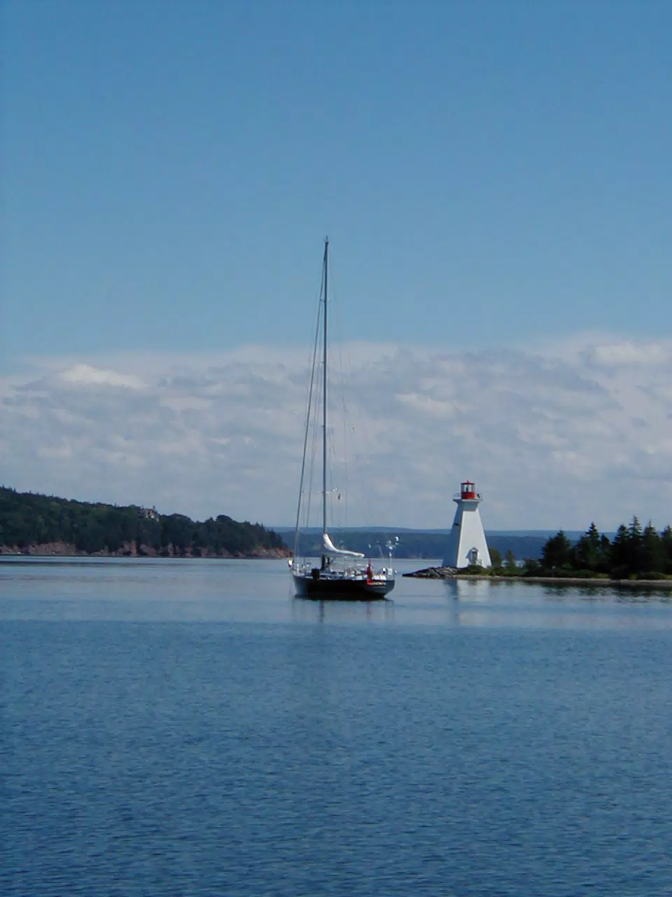 Sailboat and Lighthouse on Bras D'Or Lake, NS