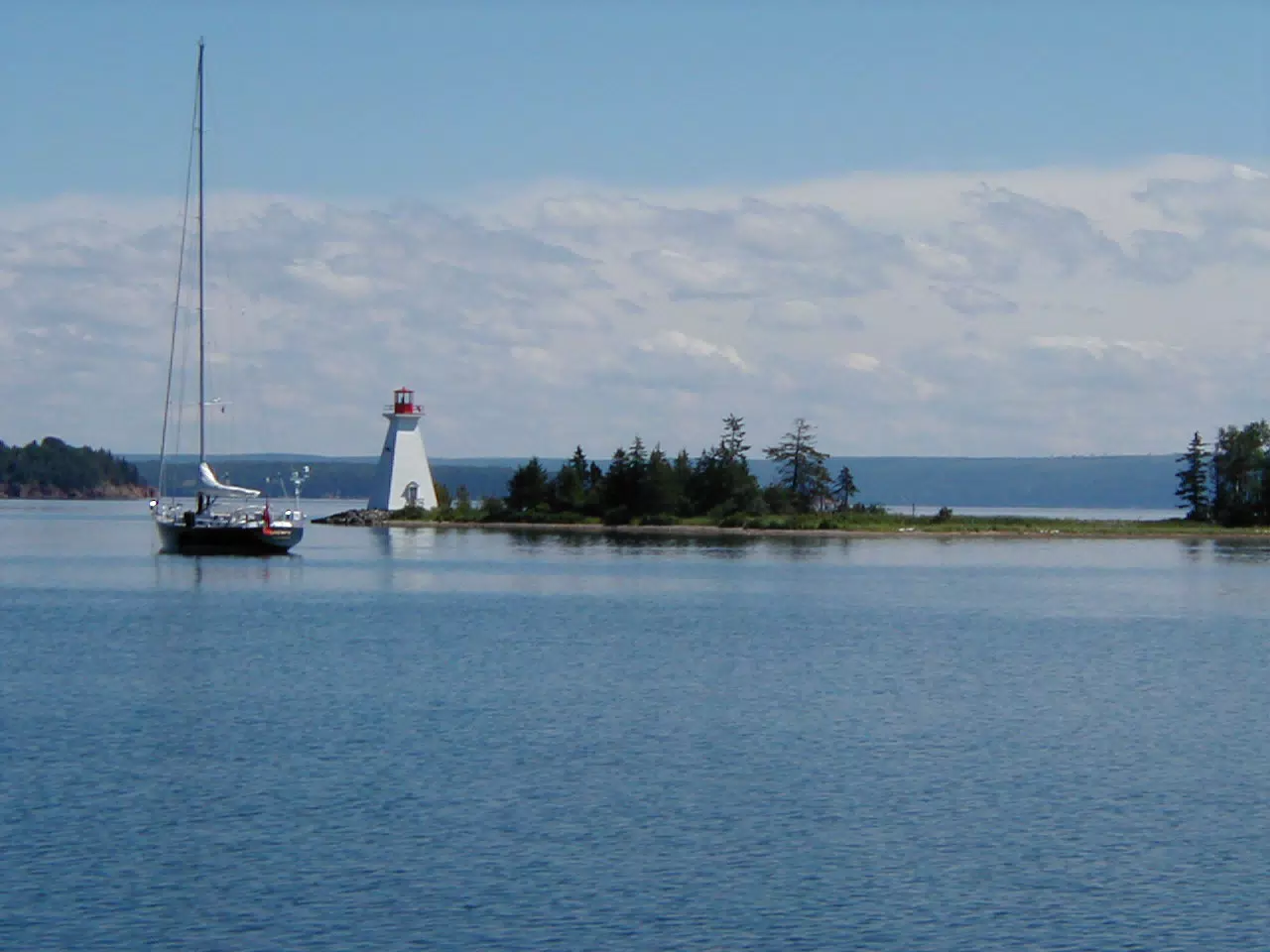 Sailboat and Lighthouse on Bras D'Or Lake, NS