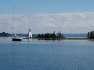Sailboat and Lighthouse on Bras D'Or Lake, NS