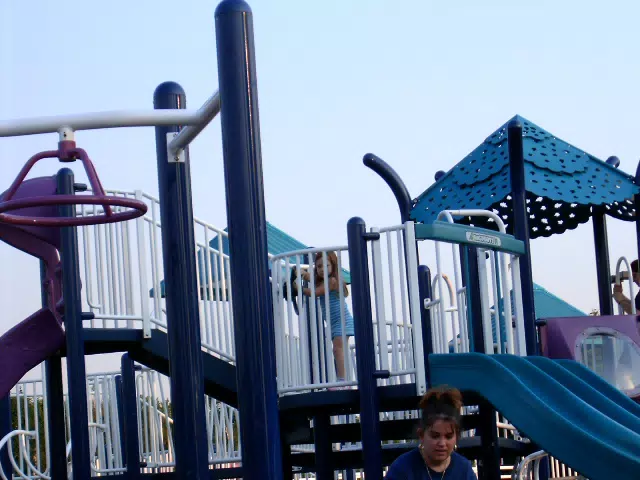 Madeline Grice on Playground in Frankfort