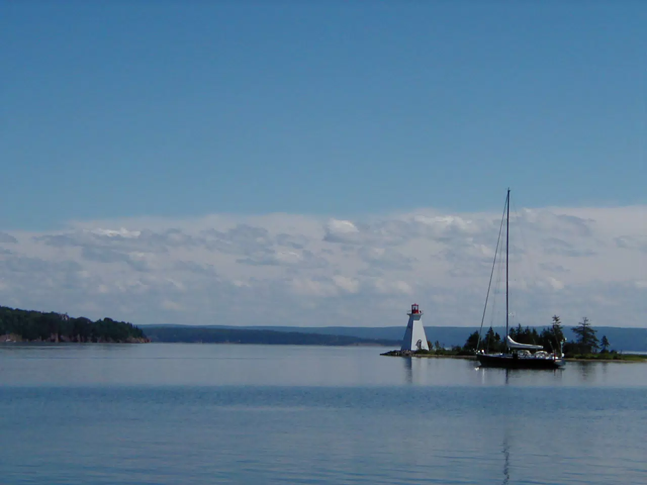 Sailboat by Lighthouse on Bras D'Or Lake, Nova Scotia