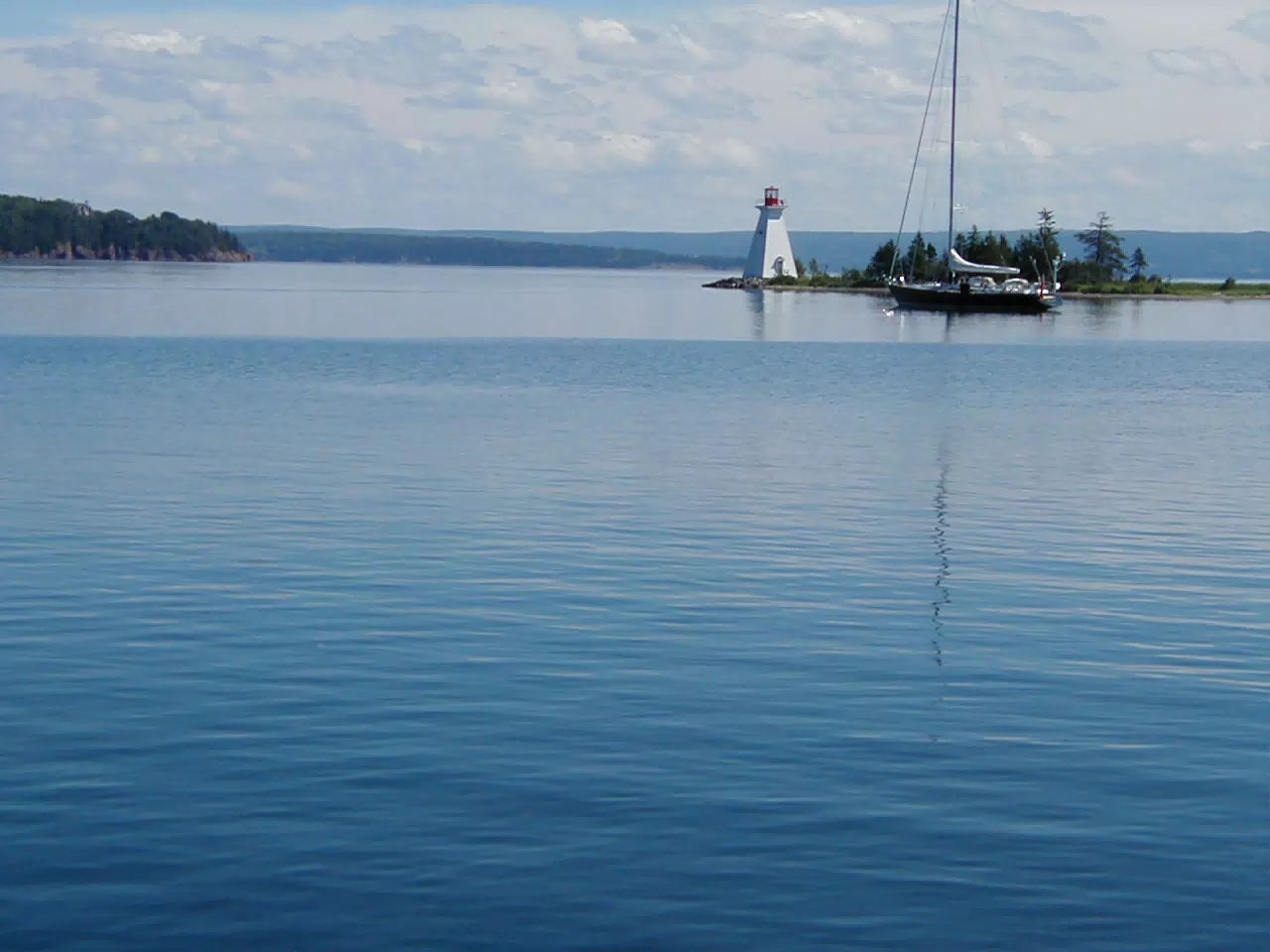 Sailboat by Lighthouse on Bras D'Or Lake, Nova Scotia