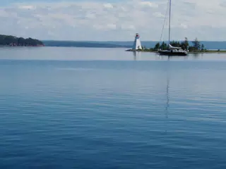 Sailboat by Lighthouse on Bras D'Or Lake, Nova Scotia