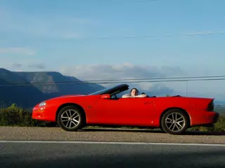 Dominica Miller in the Camaro in the Cape Breton Highlands