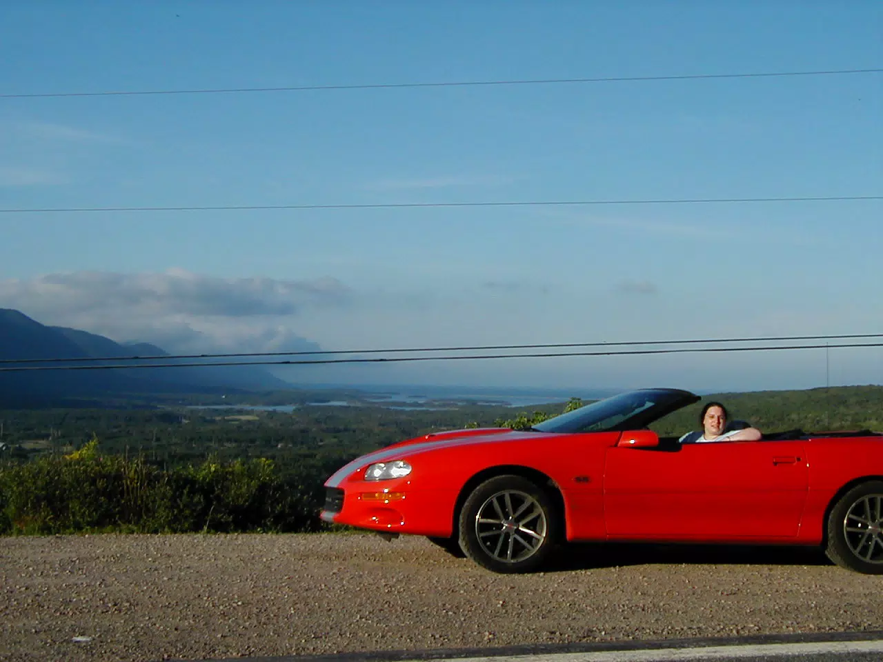 Dominica Miller in the Camaro in the Cape Breton Highlands