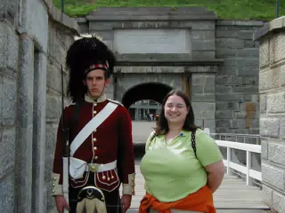 Dominica Miller Posing with Highland Guard at Halifax Citadel