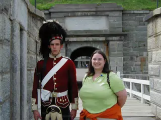 Dominica Miller Posing with Highland Guard at Halifax Citadel