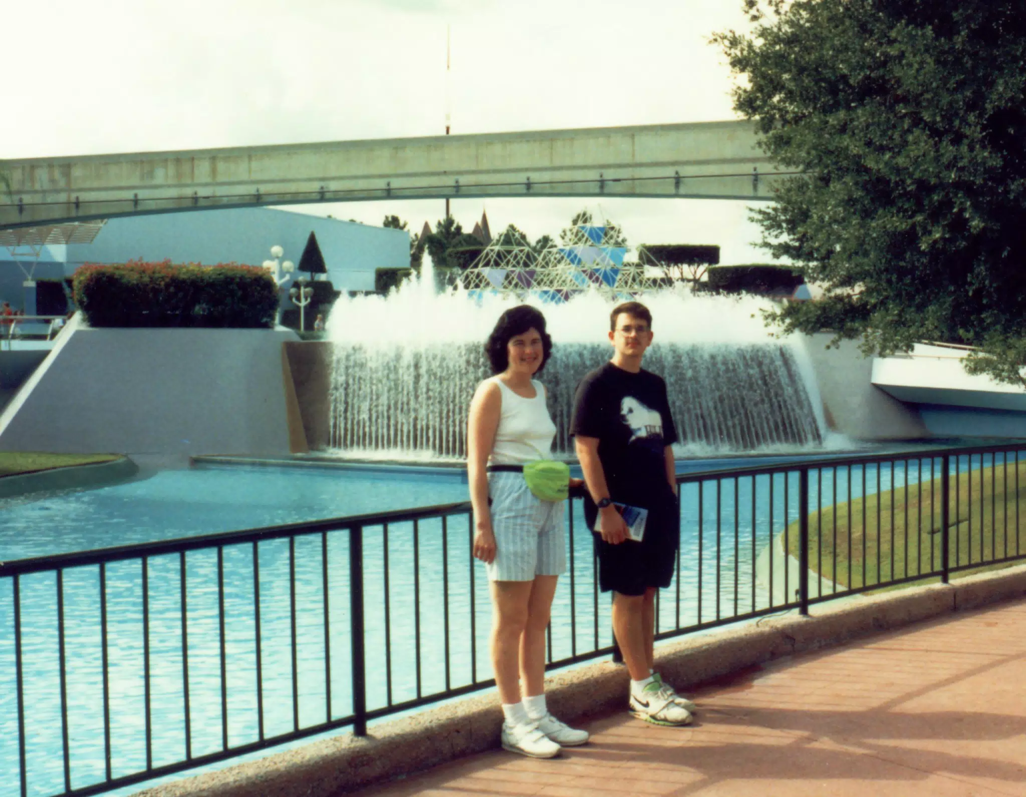 Karen Miller and Scott Alan Miller in front of Journey Into Imagination in Epcot
