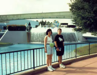 Karen Miller and Scott Alan Miller in front of Journey Into Imagination in Epcot